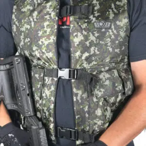 Camouflage vest with black straps and gun.