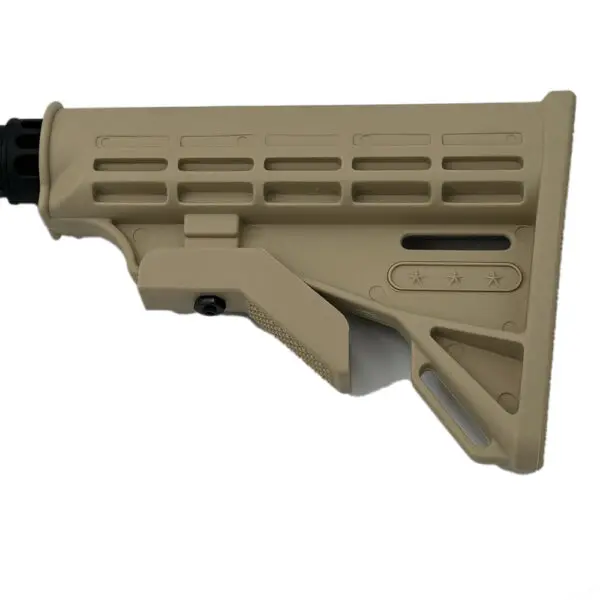 Tan AR-15 style buttstock close-up.