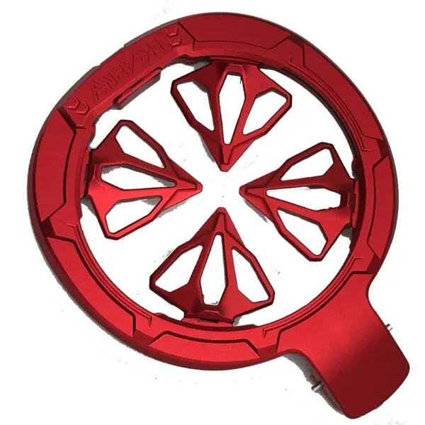 Red metal ring with starburst design.