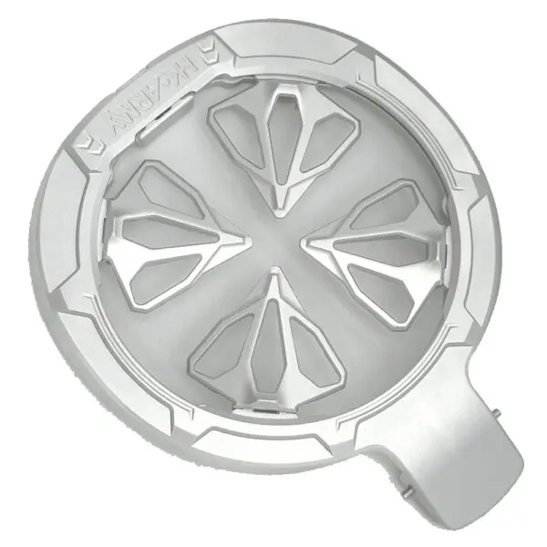 Silver metal disc with geometric design.