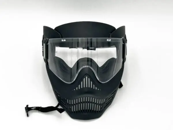 Black paintball mask with clear lens.