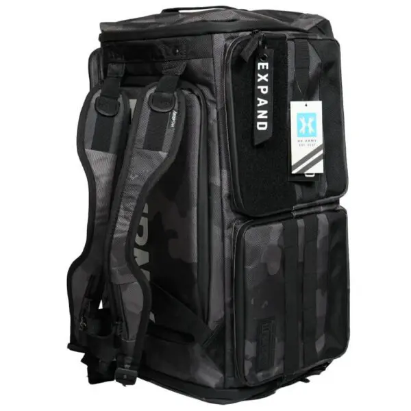 Black expandable camo backpack with multiple compartments.