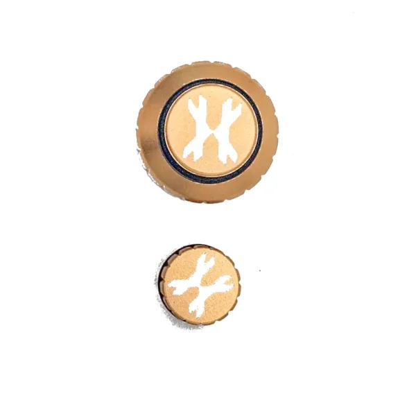 Two circular objects with wrench symbols.
